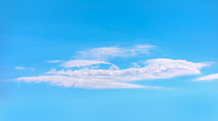 Blue sky and white clouds background - Strange clouds in the shape of a whale