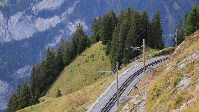 Famous cog railway tracks on the mountain Schynige Platte in Switzerland - travel photography