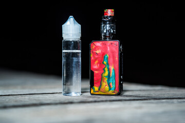 Electronic cigarette and liquid for healthy smoking without nicotine. Detail of objects to vape