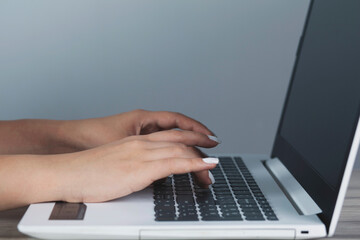 woman working in computer keyboard