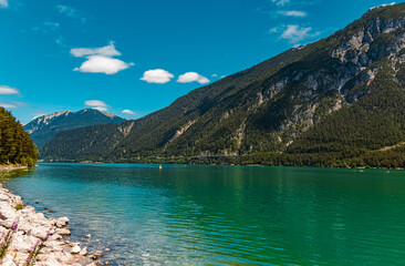 Obraz premium Beautiful alpine view with reflections at the famous Achensee, Pertisau, Tyrol, Austria
