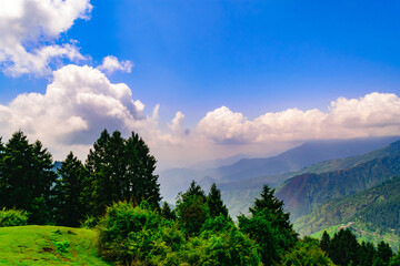 View enroute to Prashar Lake trekk trail. It is located at a height of 2730 m above sea level surrounded by lesser himalayas peaks of Shivalik & Pir panjal near Mandi, Himachal Pradesh, India.