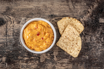 Traditional Mexican cheese sauce and nacho chips