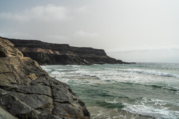 Fototapeta premium Rocky coast of the Atlantic Ocean. Fuerteventura. Canary Islands. Spain.