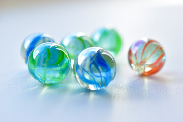 Decorative multicolored glass balls on a white background