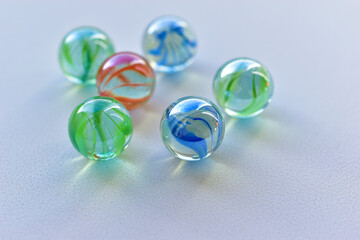 Decorative multicolored glass balls on a white background