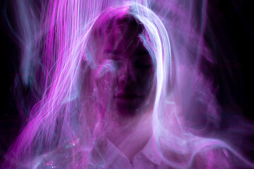 Girl in colored neon light, light painting