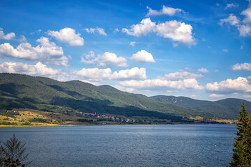 Relaxing mountain landscape at lake with calm water and beauty sky,