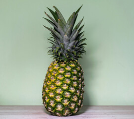 Pineapple on the table. Large fruit