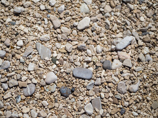 Top view of pebbles on the beach