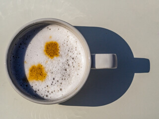 Top view of a cup of cappuccino