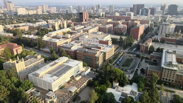 UCLA Mathematical, Sciences building, aerial over campus building, Westwood in the distance, Los Angeles
