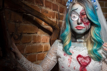 Halloween concept of bride in white dress and bloody makeup, mystical devil bride