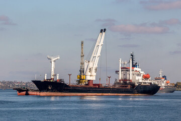  large dry cargo ship on the roadstead of the Dnieper river