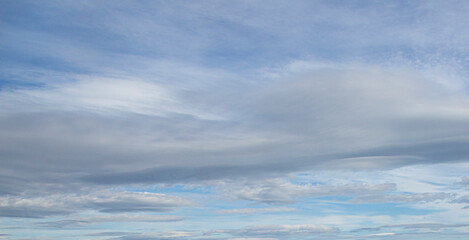 Image of a partly cloudy and partly clear sky during the day