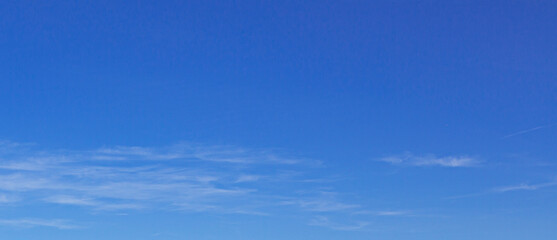 Image of a partly cloudy and partly clear sky during the day