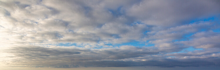 Image of a partly cloudy and partly clear sky during the day