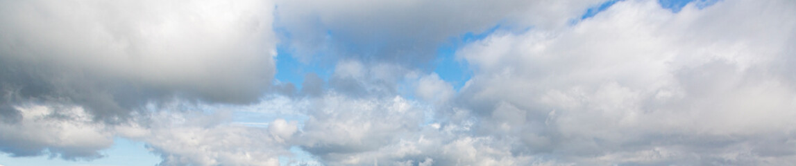 Image of a partly cloudy and partly clear sky during the day