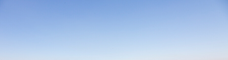 Image of a partly cloudy and partly clear sky during the day