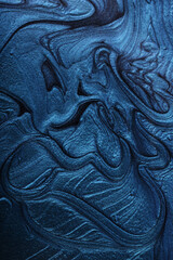 Vertical blue shimmer abstract background. Make up concept.Beautiful stains of liquid nail laquers.Fluid art,pour painting technique.Horizontal banner,can be used as backdrop for chat.