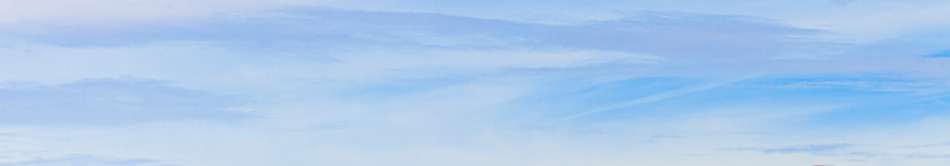 Image of a partly cloudy and partly clear sky during the day