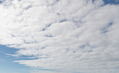 Image of a partly cloudy and partly clear sky during the day