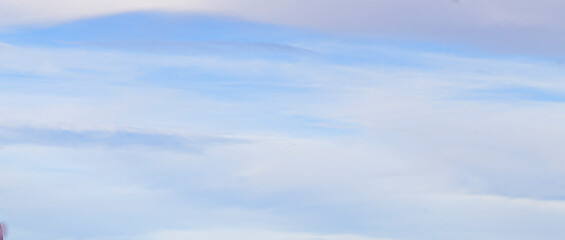 Fototapeta premium Image of a partly cloudy and partly clear sky during the day