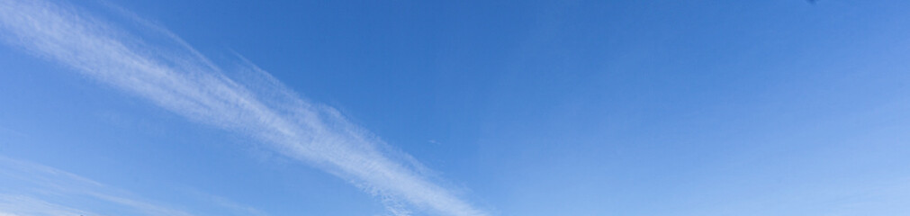 Image of a partly cloudy and partly clear sky during the day