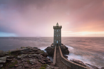 Beautiful Kermorvan lighthouse, most western part of France, Le Conquet, Bretagne, France Stormy weather in coastline. © Michal