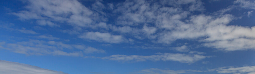 Image of a partly cloudy and partly clear sky during the day
