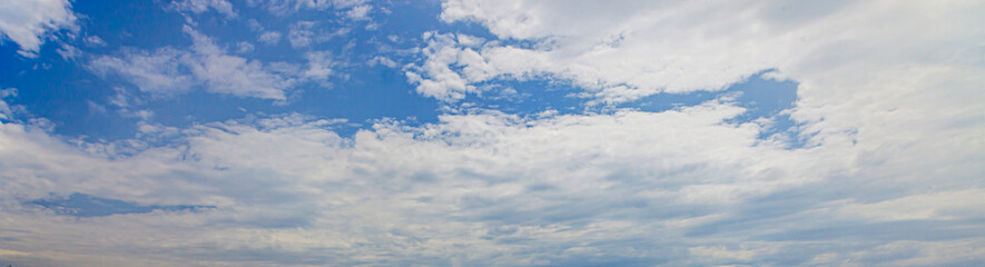 Image of a partly cloudy and partly clear sky during the day