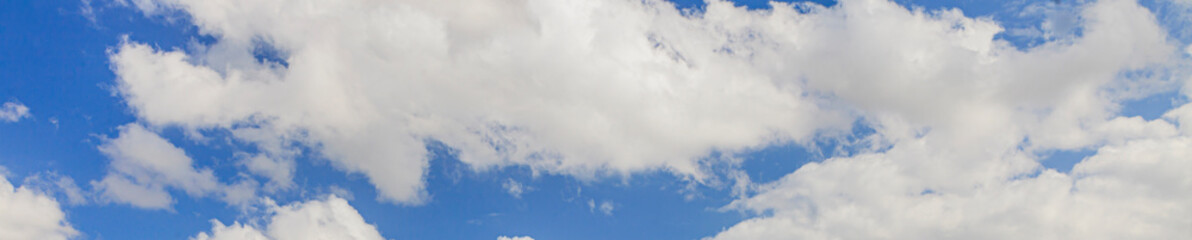 Image of a partly cloudy and partly clear sky during the day
