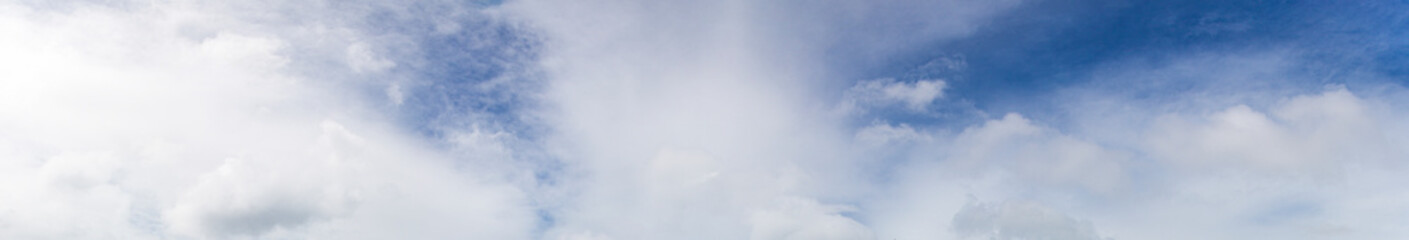 Image of a partly cloudy and partly clear sky during the day