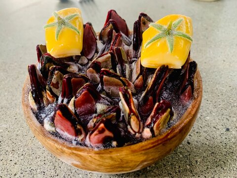 Single dish photo at Central Restaurante at Lima of Peru, contains yellow razor clam