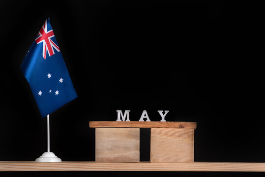 Wooden calendar of May with Australian flag on black background. Holidays of Australia in May