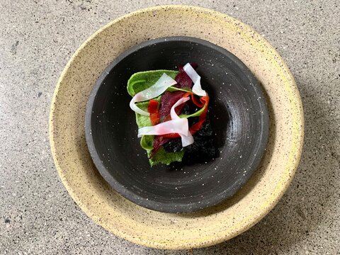 Single dish photo at Central Restaurante at Lima of Peru, name: SEA TERRAIN (Squid, Huarango, Sargassum) 15m
