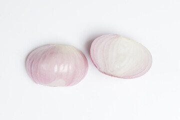 Fototapeta na wymiar peeled pink onion on a white background