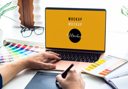 Graphic Designer Working on Laptop Mockup