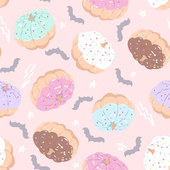 Cute pumpkins in shape of donuts in pastel colors. Seamless pattern