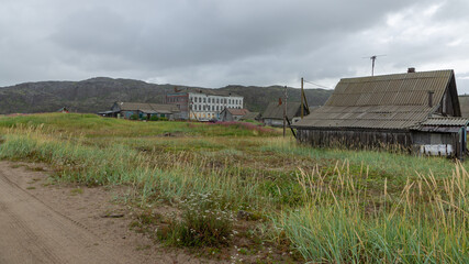 Houses in the village of Teriberka on the Barents sea coast, Russia, August 2020
