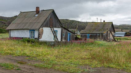 Houses in the village of Teriberka on the Barents sea coast, Russia, August 2020