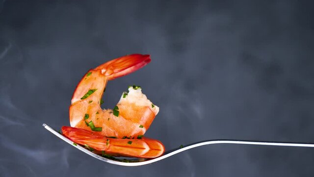 shrimp on fork with smoke/ steam