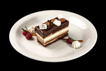 Delicious piece of chocolate cake on a white plate