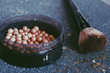 Powder pearls and brush 