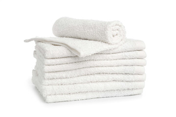 several white beach cotton towels folded on white background