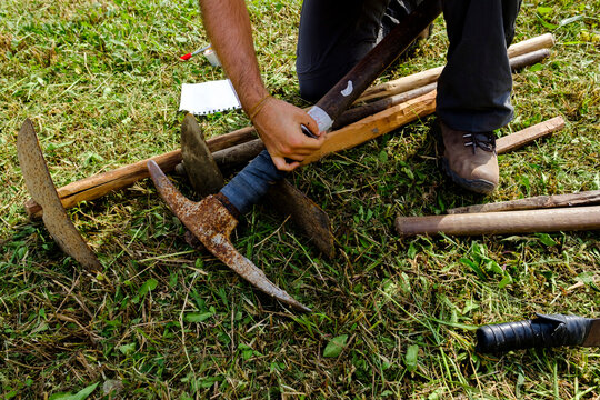 person and garden tools