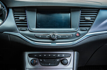 Fototapeta na wymiar Car interior. Dashboard. Radio in the car. 