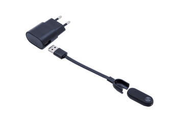 Smart watch on charge. Fitness watch and charger. Sports watch on white background.