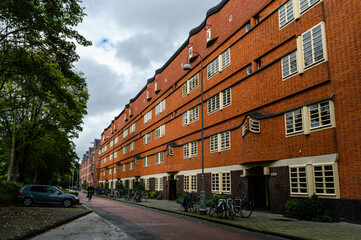 AMSTERDAM, THE NETHERLANDS OCTOBER 07, 2020: Street vie of houses build in the architectural style 