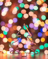 Christmas tree toy for home decoration on the background of Christmas lights. defocus christmas lights.